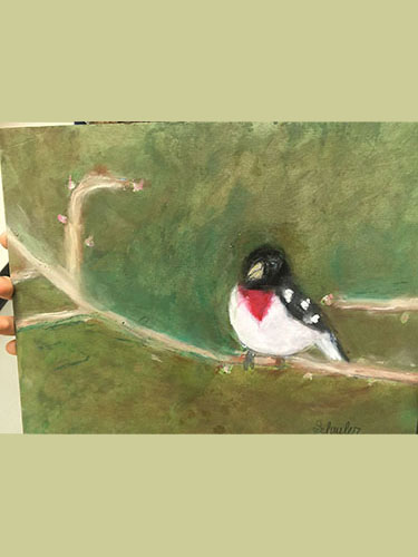 Watercolor painting of bird perched on branch